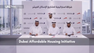Signing ceremony for Dubai Affordable Housing Initiative agreement.